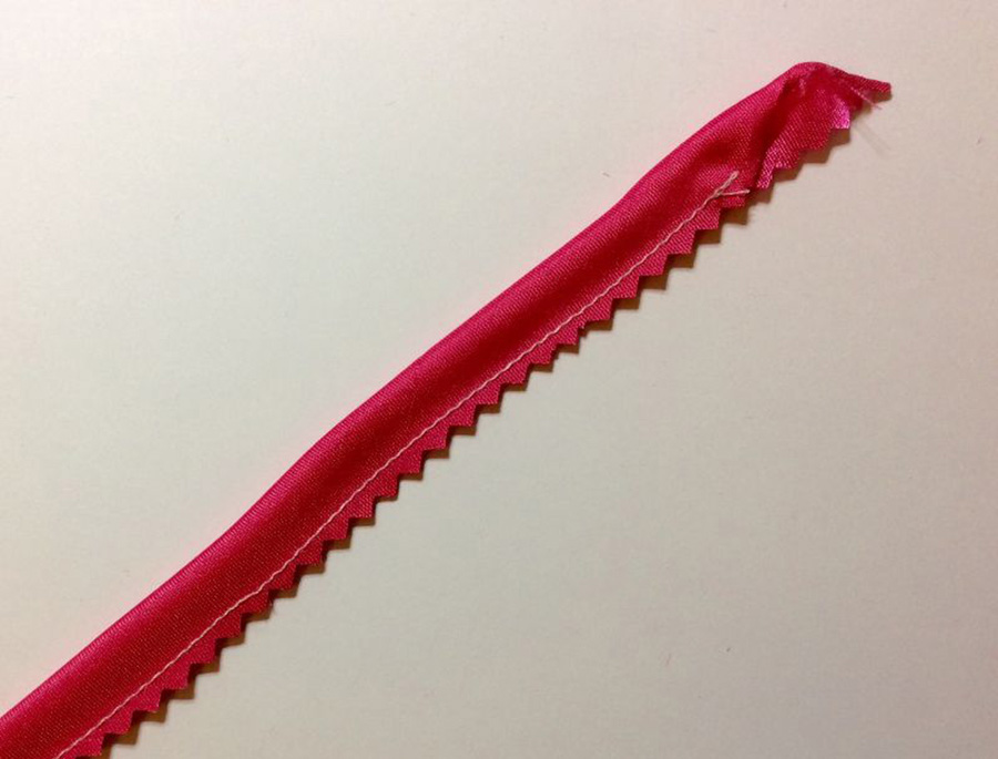 Trim off the excess fabric with pinking shears